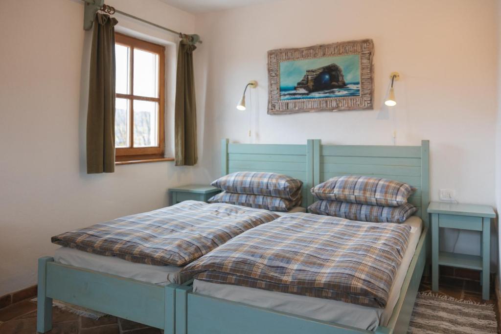 Postel nebo postele na pokoji v ubytování Guesthouse Novak