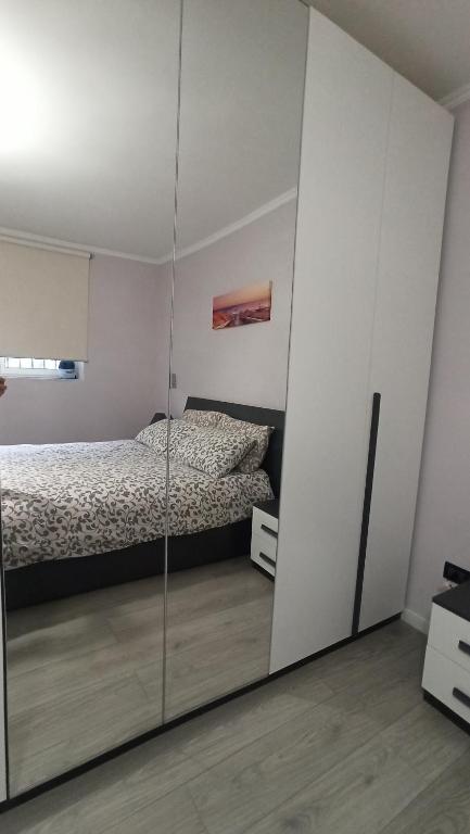 A bed or beds in a room at La nostra casetta