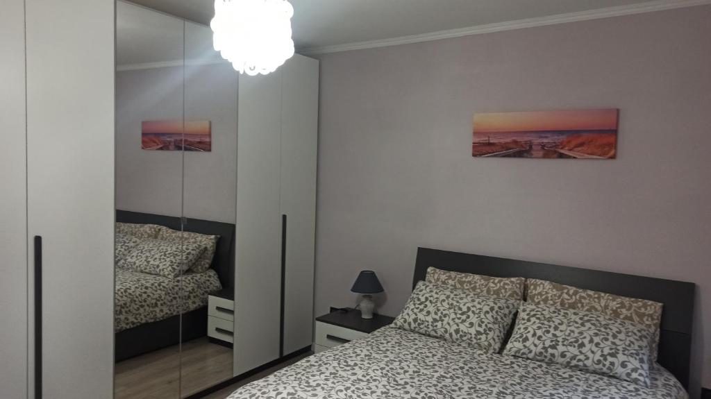 A bed or beds in a room at La nostra casetta