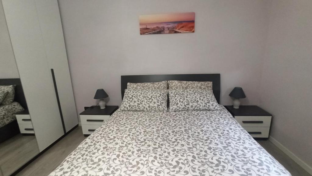 A bed or beds in a room at La nostra casetta