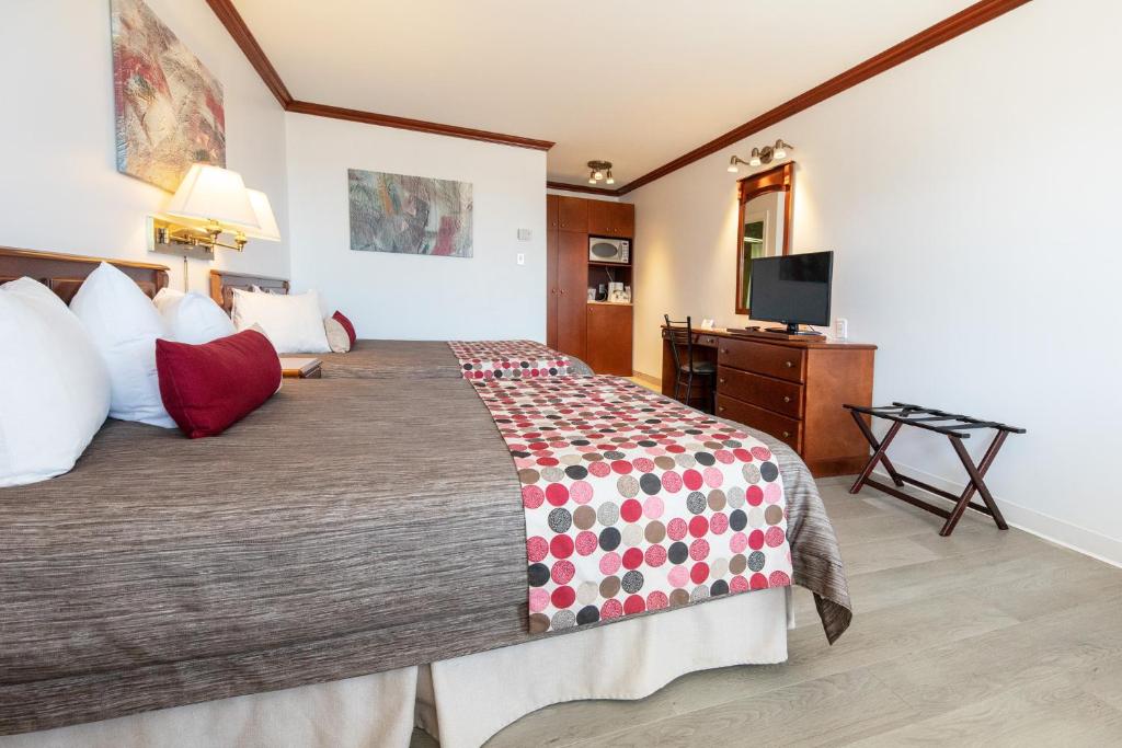 Postel nebo postele na pokoji v ubytování Hotel Plante