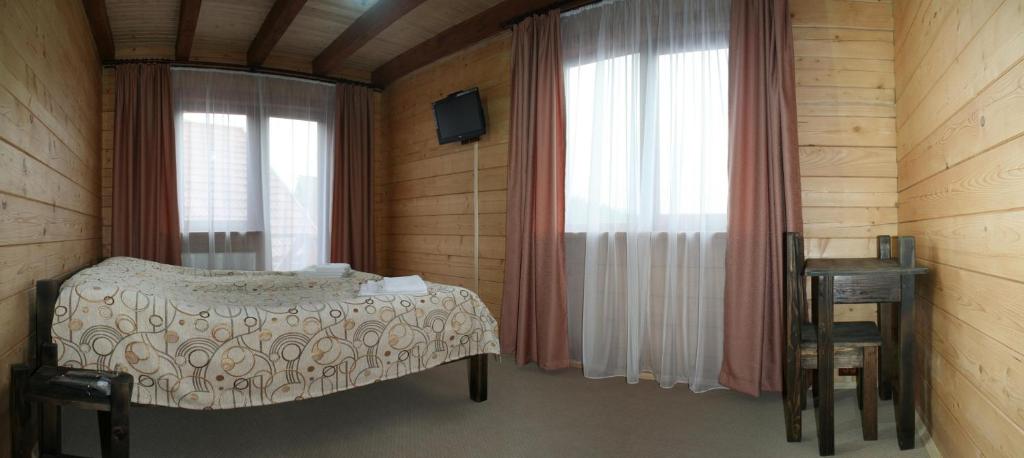 Postel nebo postele na pokoji v ubytování Highland