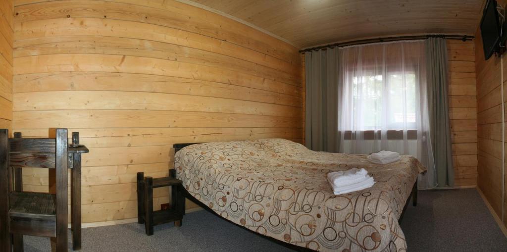 Postel nebo postele na pokoji v ubytování Highland