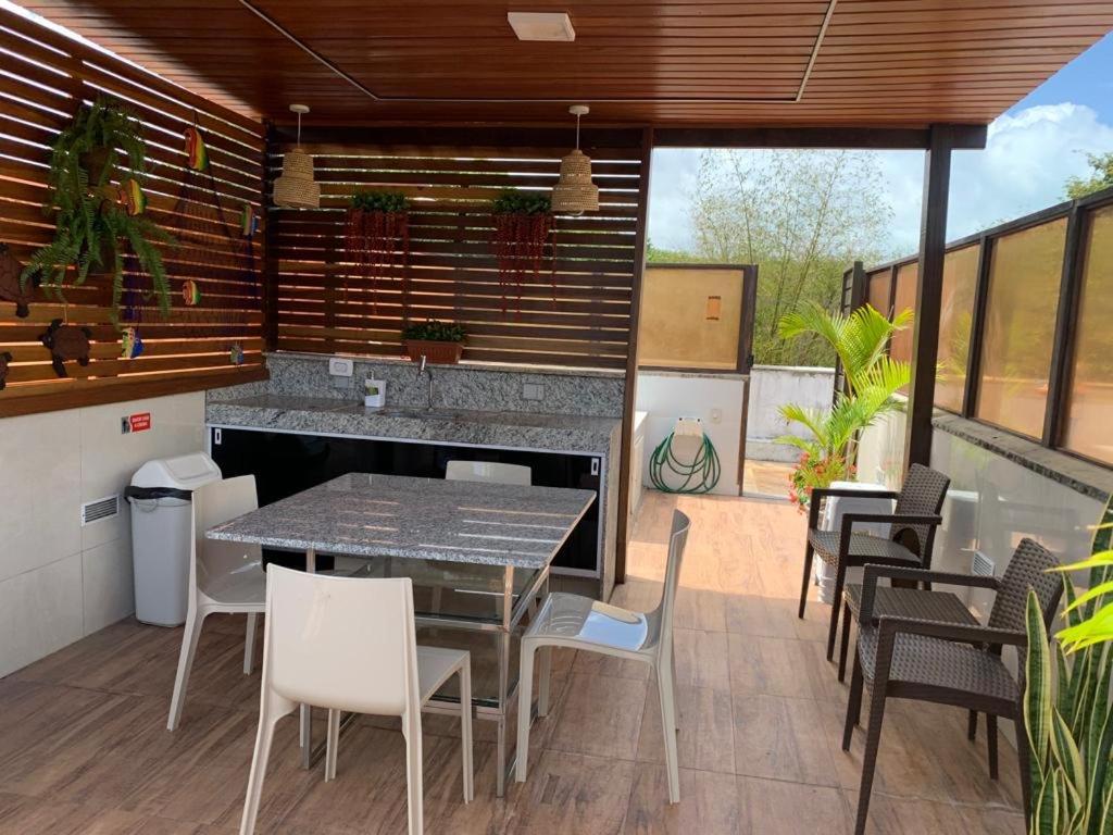 Patio nebo venkovní prostory v ubytování Pipa Ubaia 219 com solarium