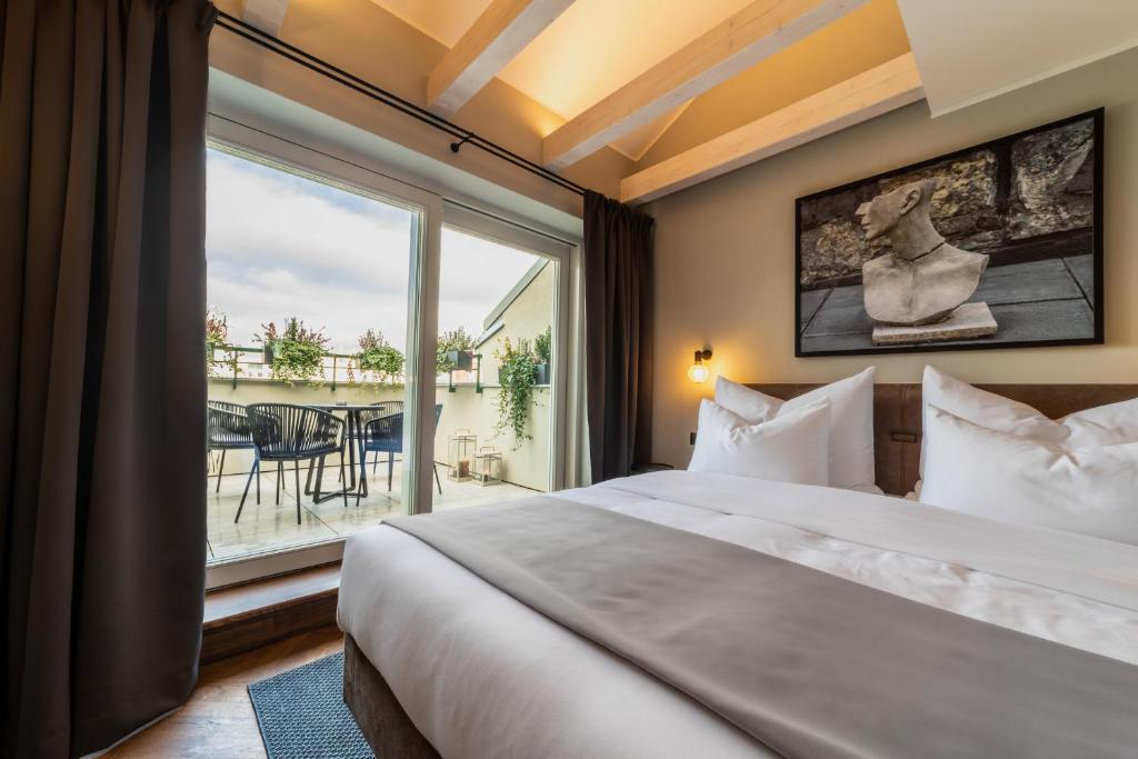 Letto o letti in una camera di The Viaduct - Suites & More