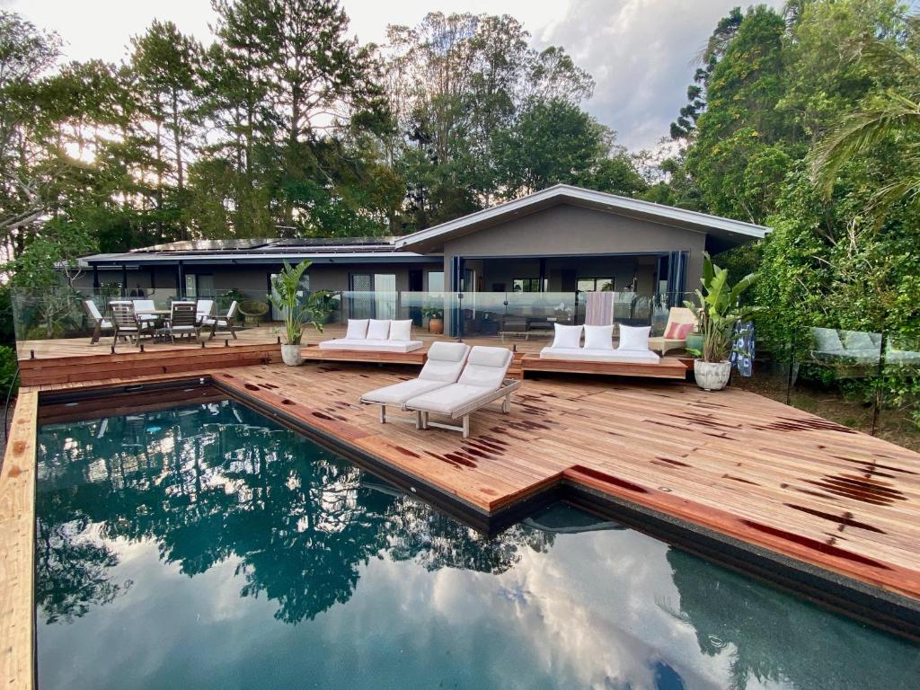 a house with a swimming pool and a deck at Balmoral 575 in Montville