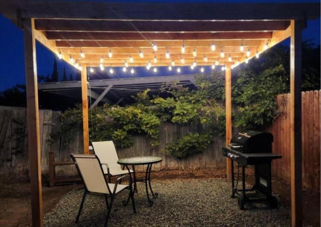 a pergola with a table and a piano at Comfy stay in private 2beds, 1bath kitchen RV in Escondido