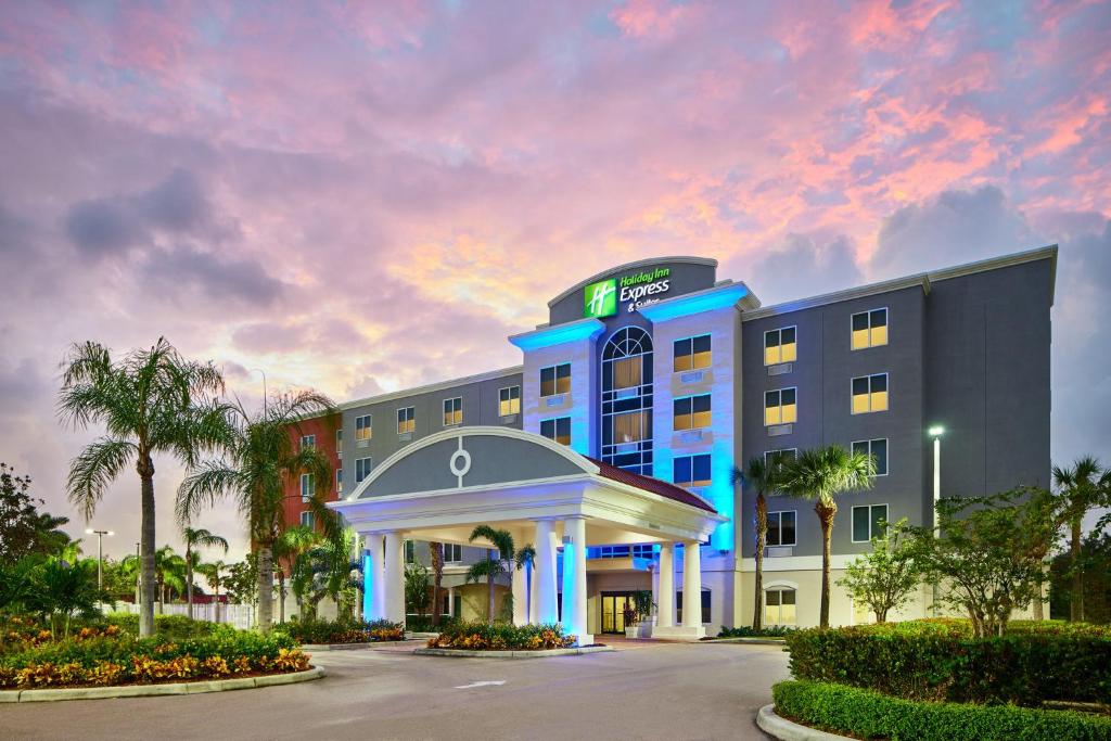 a rendering of a hotel with a building at Holiday Inn Express Hotel & Suites Port St. Lucie West, an IHG Hotel in Port Saint Lucie