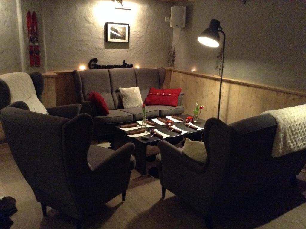 Posezení v ubytování Le Chalet de l'Atelier - Le Nord