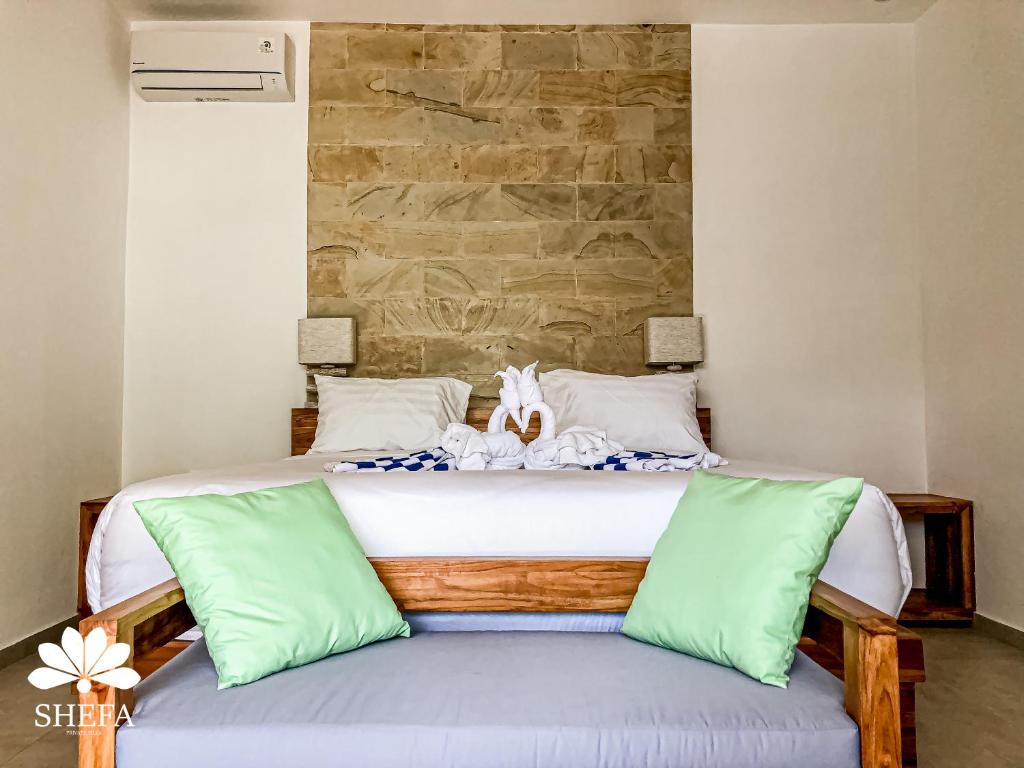 Postel nebo postele na pokoji v ubytování Shefa Private Villa