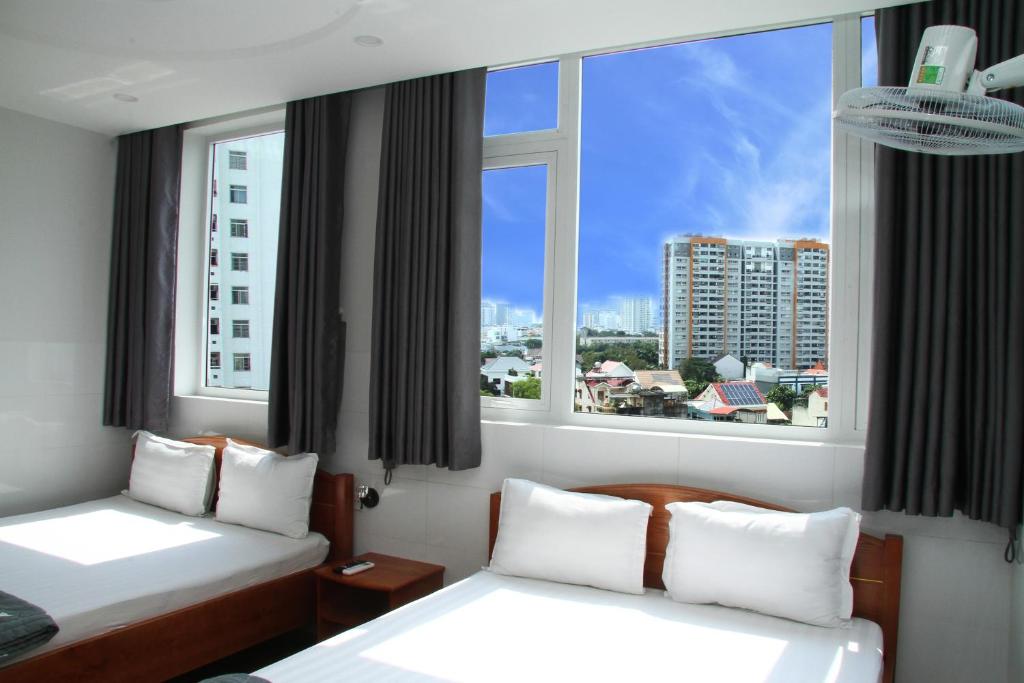 Postel nebo postele na pokoji v ubytování HOTEL NGUYEN ANH