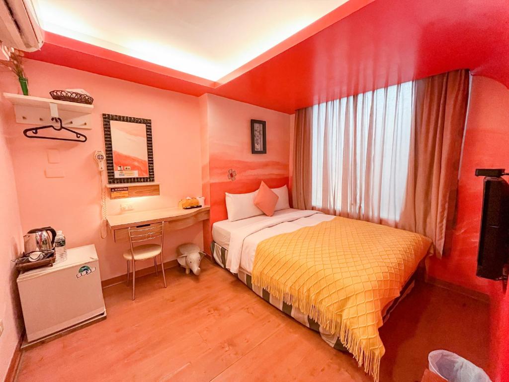 Postel nebo postele na pokoji v ubytování Tz Shin Resort Hostel