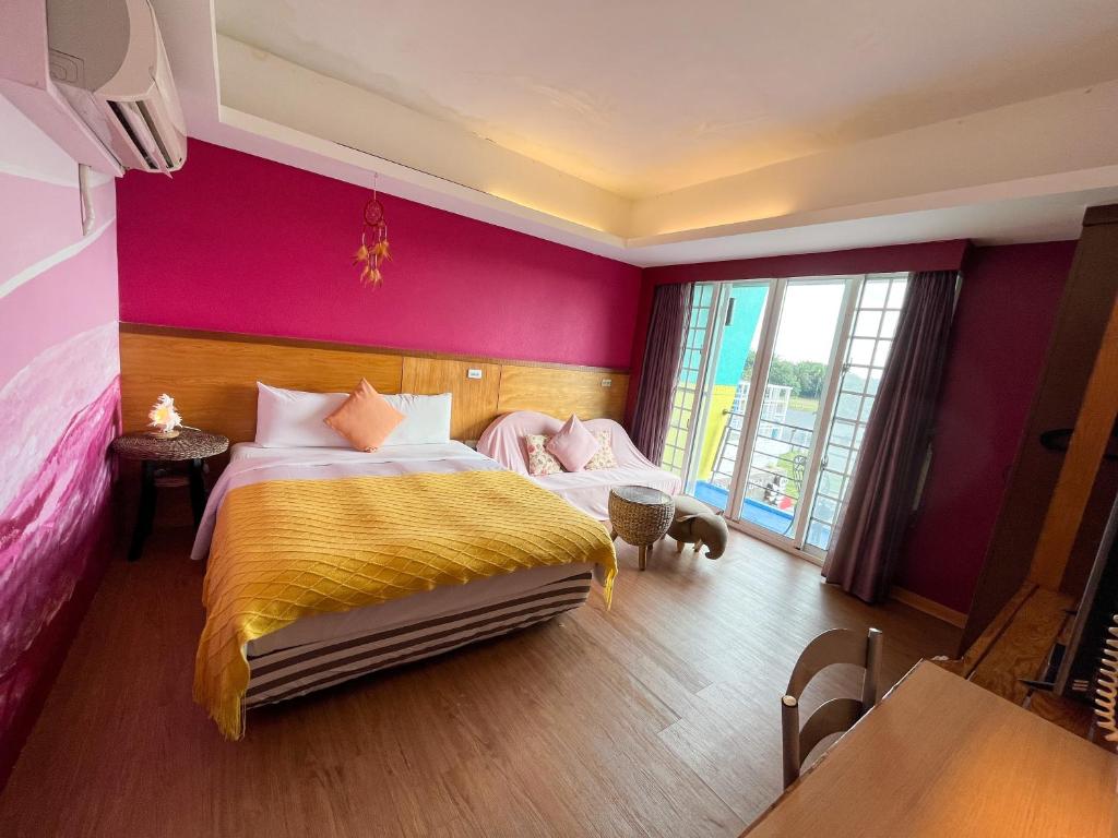 Postel nebo postele na pokoji v ubytování Tz Shin Resort Hostel