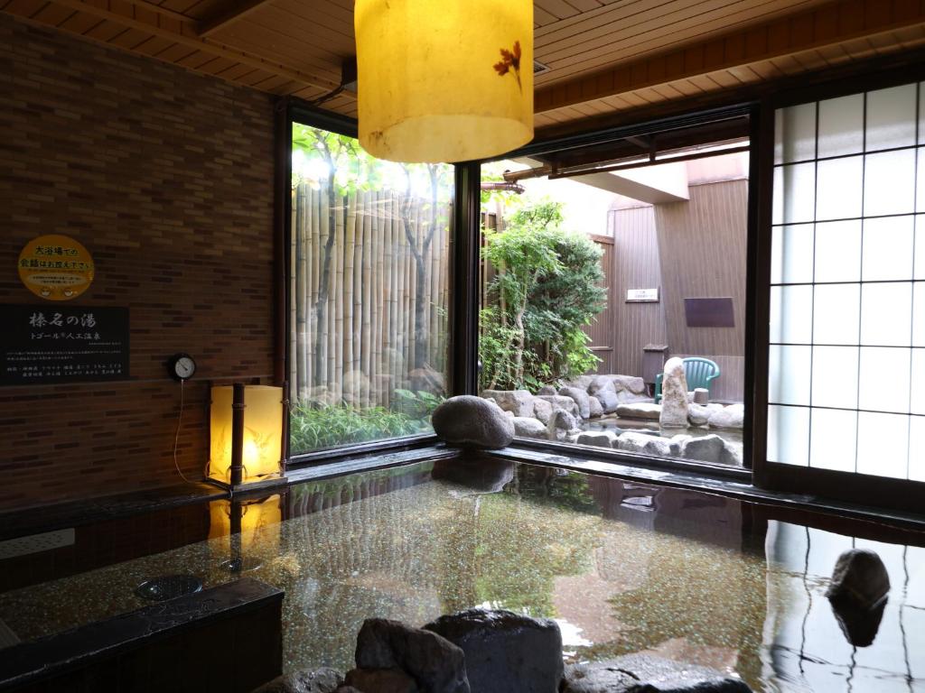 Posezení v ubytování Dormy Inn Takasaki