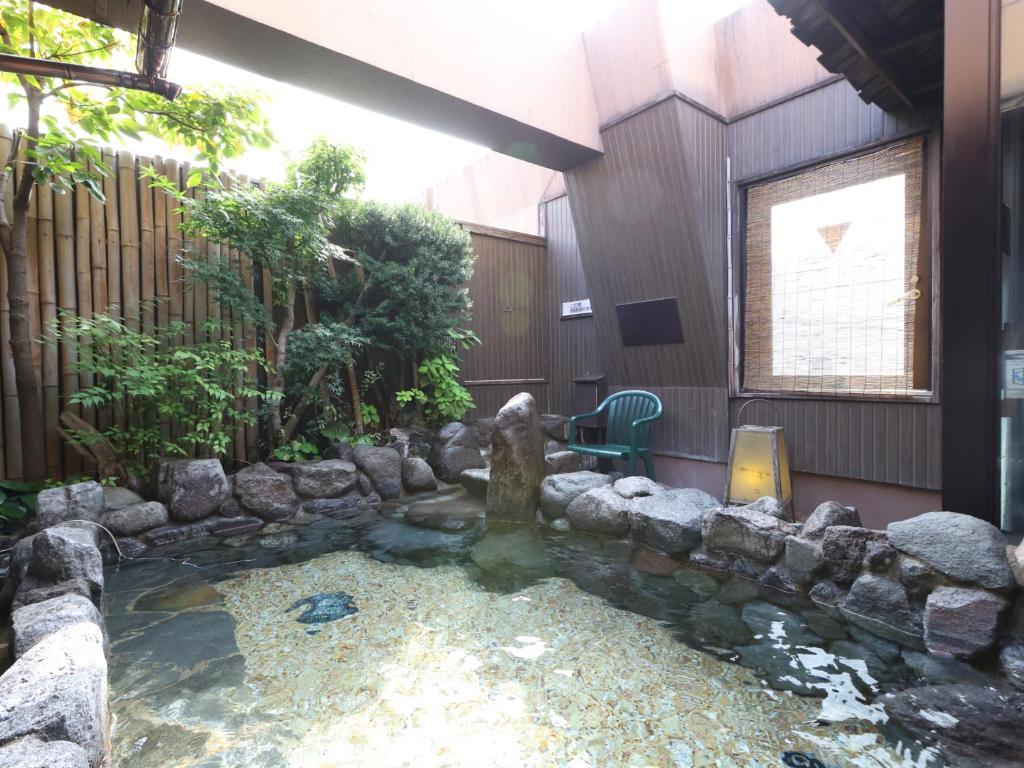 Zahrada ubytování Dormy Inn Takasaki