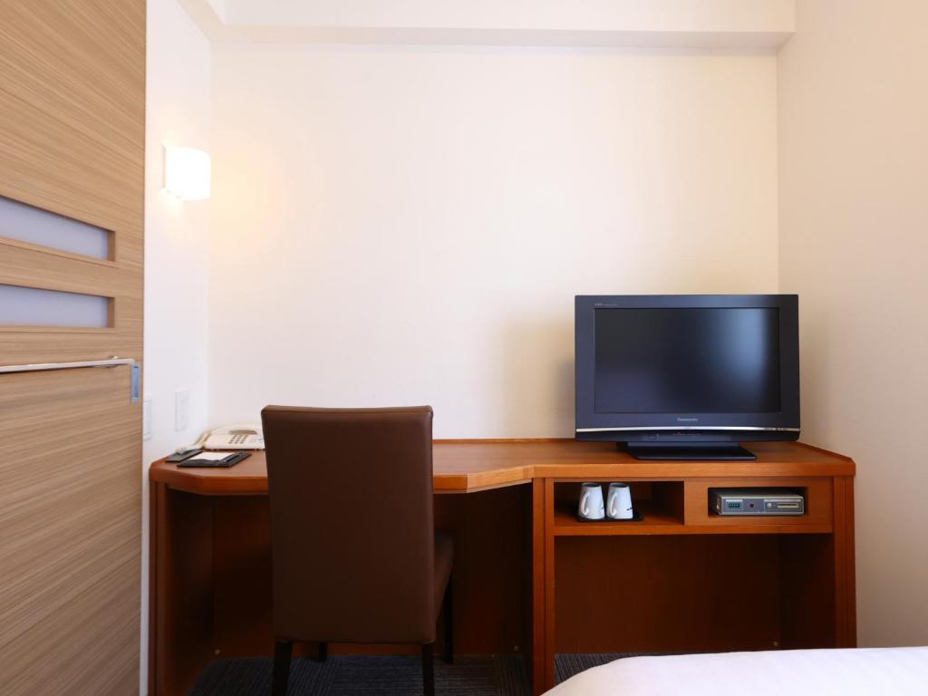 TV a/nebo společenská místnost v ubytování Dormy Inn Takasaki