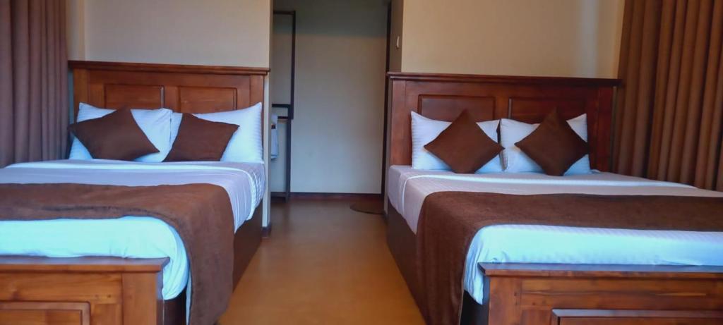 Postel nebo postele na pokoji v ubytování Misty Villas