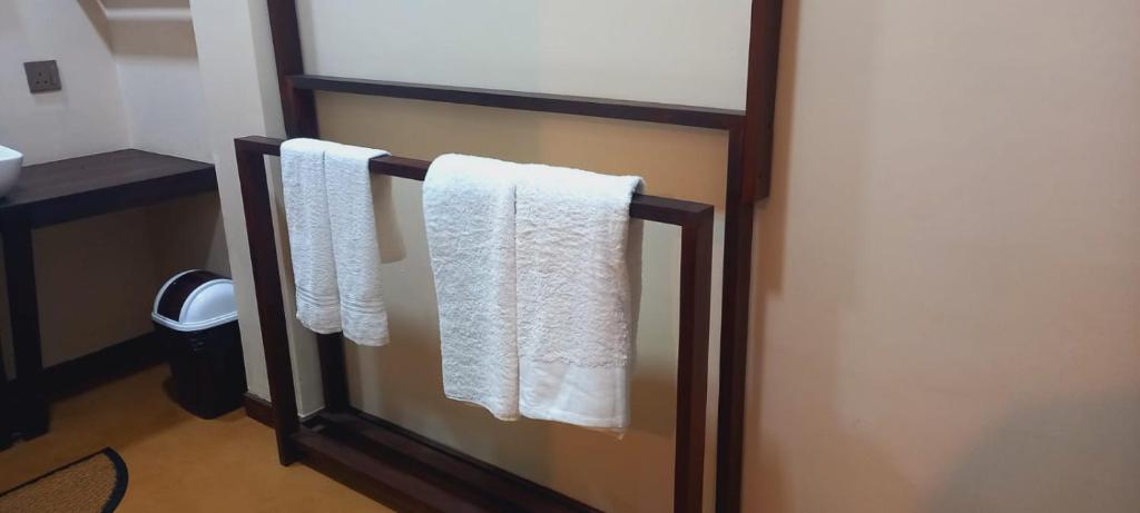 Postel nebo postele na pokoji v ubytování Misty Villas