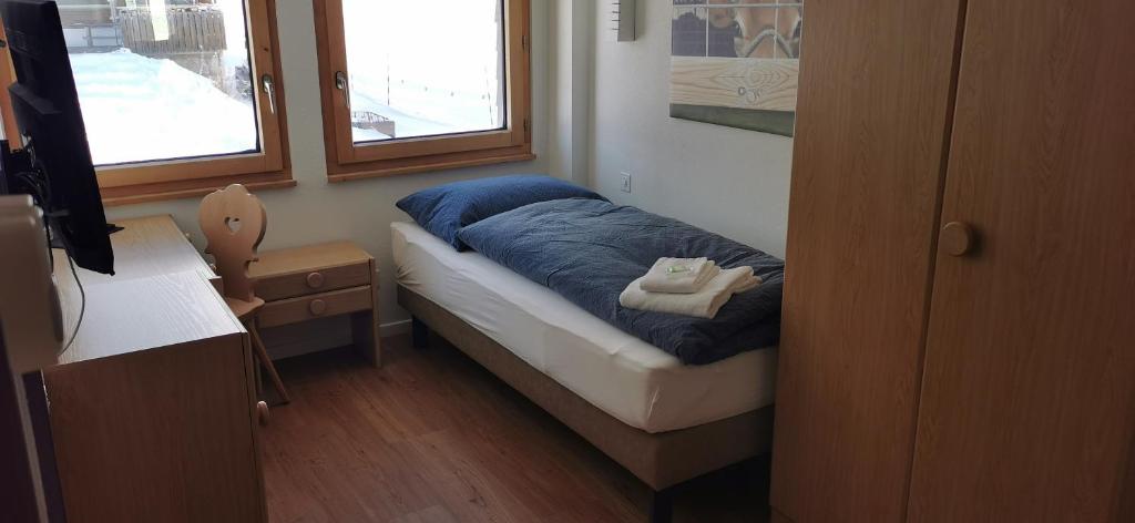 Postel nebo postele na pokoji v ubytování Alpenlodge Kühboden