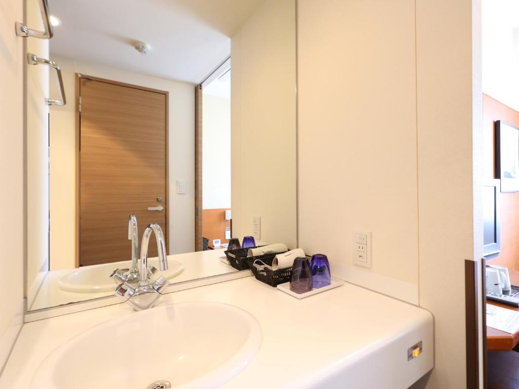 Koupelna v ubytování Dormy Inn Takasaki