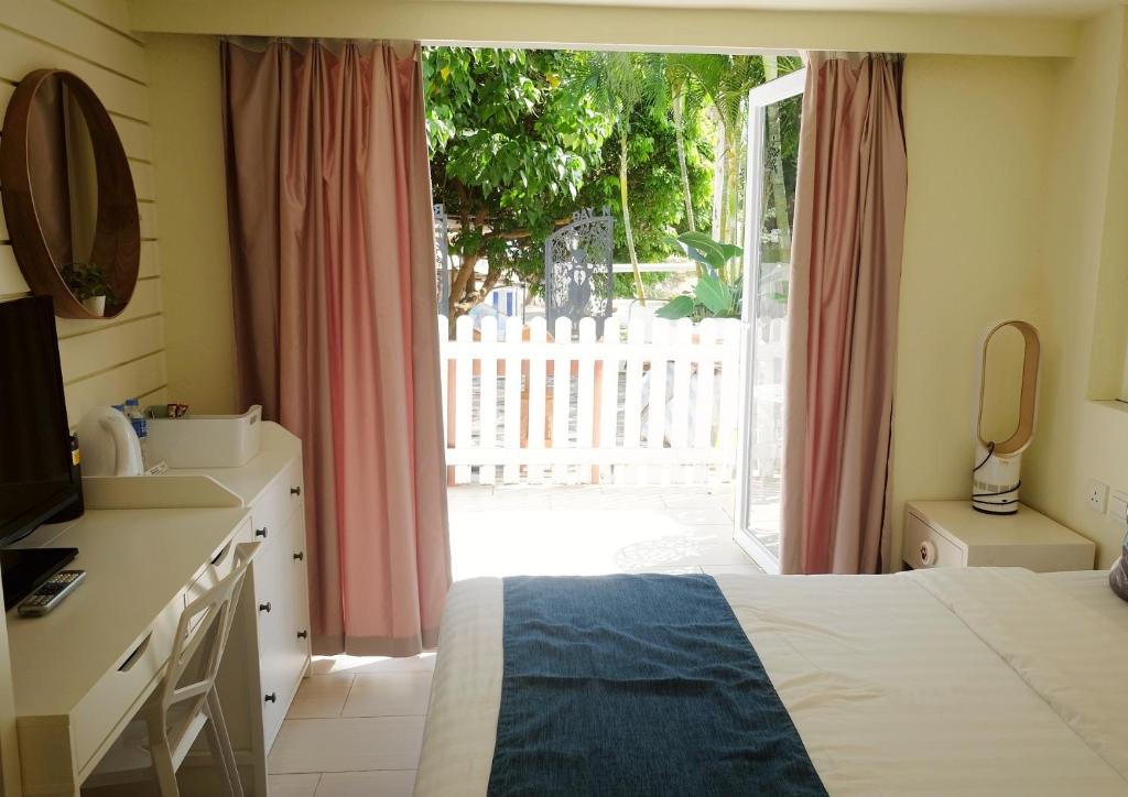 Postel nebo postele na pokoji v ubytování Bellagio Pets Friendly Resort