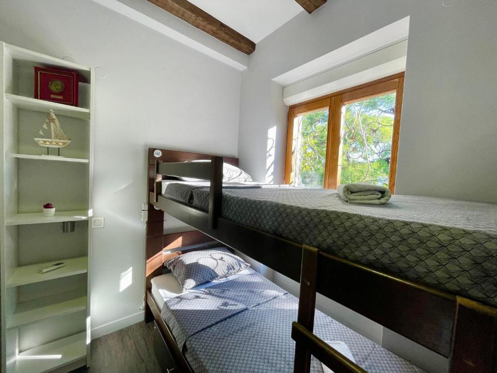 Posteľ alebo postele v izbe v ubytovaní Das Hostel Rijeka