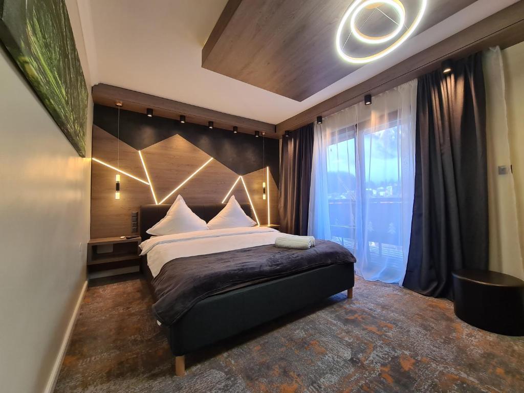 Postel nebo postele na pokoji v ubytování CASA FLORESCU