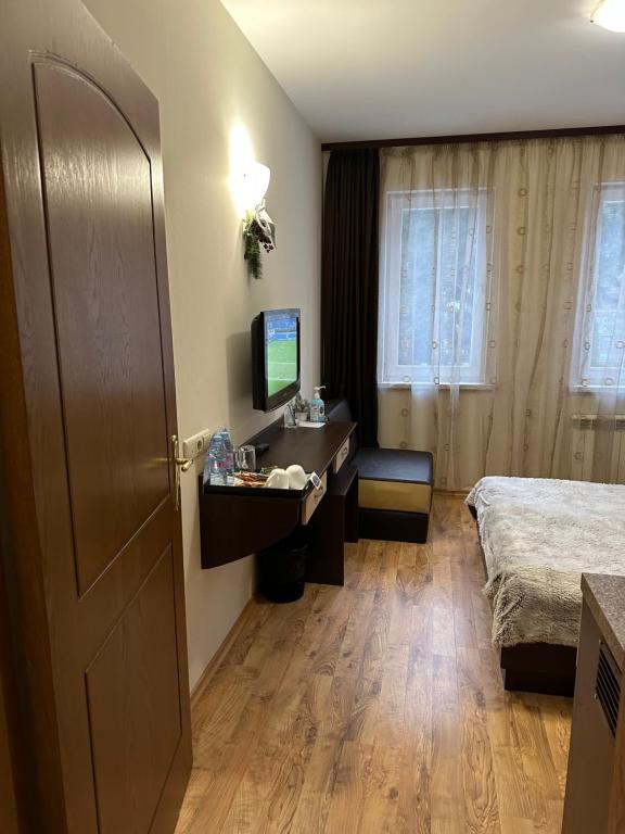 Apartments & Rooms Royal Plaza - Deluxe Double Room (2 Adultos + 1 Niño)
