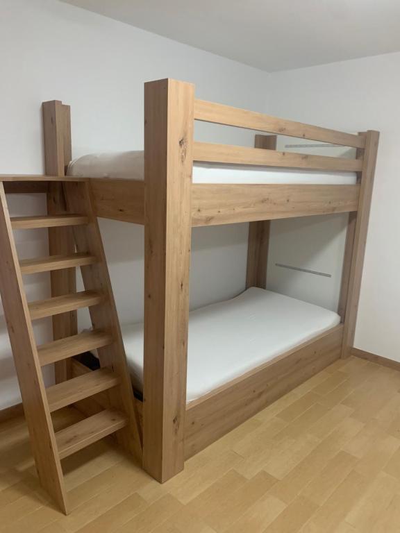 Postel nebo postele na pokoji v ubytování Obereggen - Anna