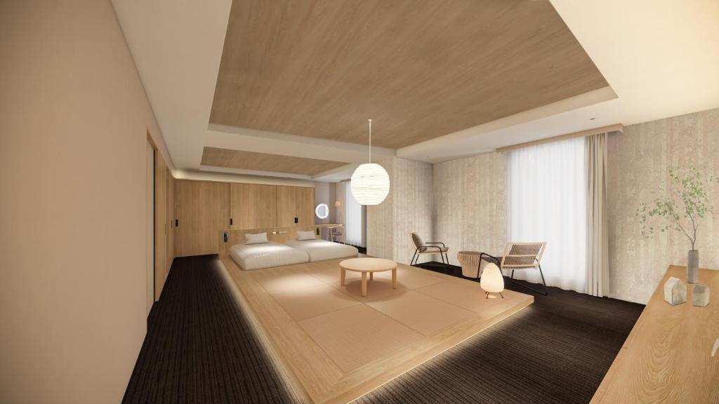 a living room with a couch and a table at Richmond Hotel Premier Tokyo Schole in Tokyo