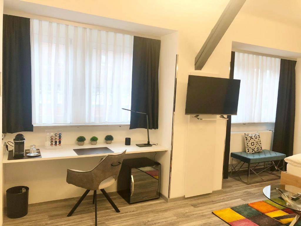 TV a/nebo společenská místnost v ubytování Hotel Garni "Brauerei Keller"