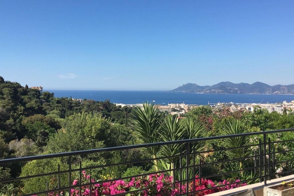 a view of the ocean from a balcony at Sea View & Large Terrace LIVE IN LA VISTA in Cannes