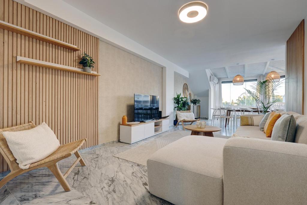 Posezení v ubytování Bright Nordic style penthouse in beachside resort