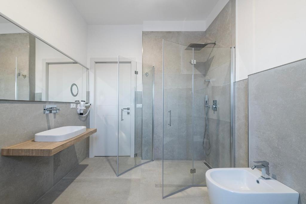 Koupelna v ubytování Azzurra Aparthotel