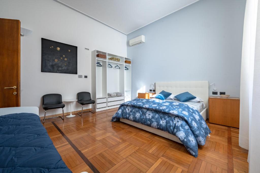 A bed or beds in a room at The Art Gallery