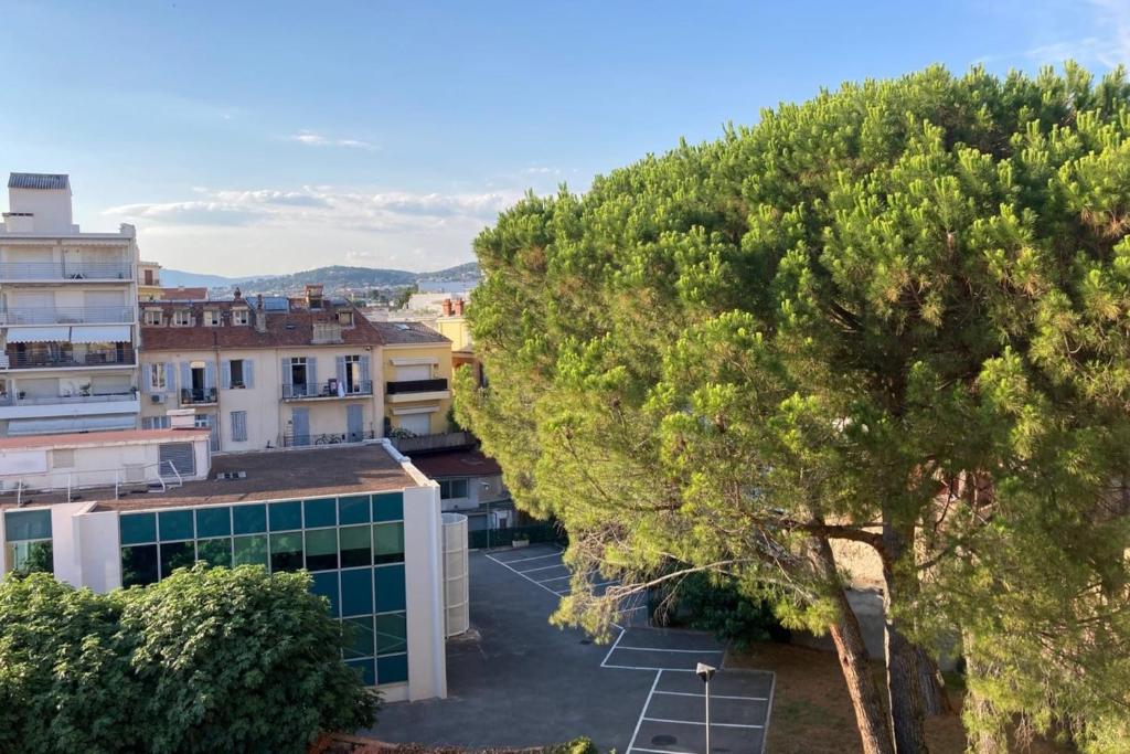 an aerial view of a city with trees and buildings at Cosy Studio Cannes Center beaches shopping and congresses LIVE IN MERLE in Cannes