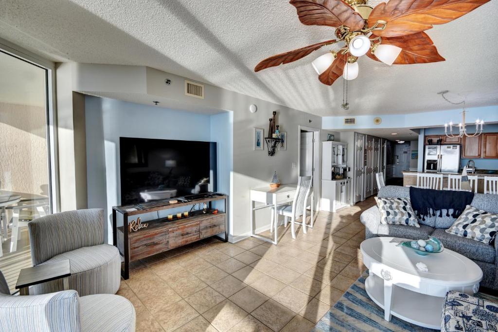 A television and/or entertainment centre at Crescent Shores 911 Condo