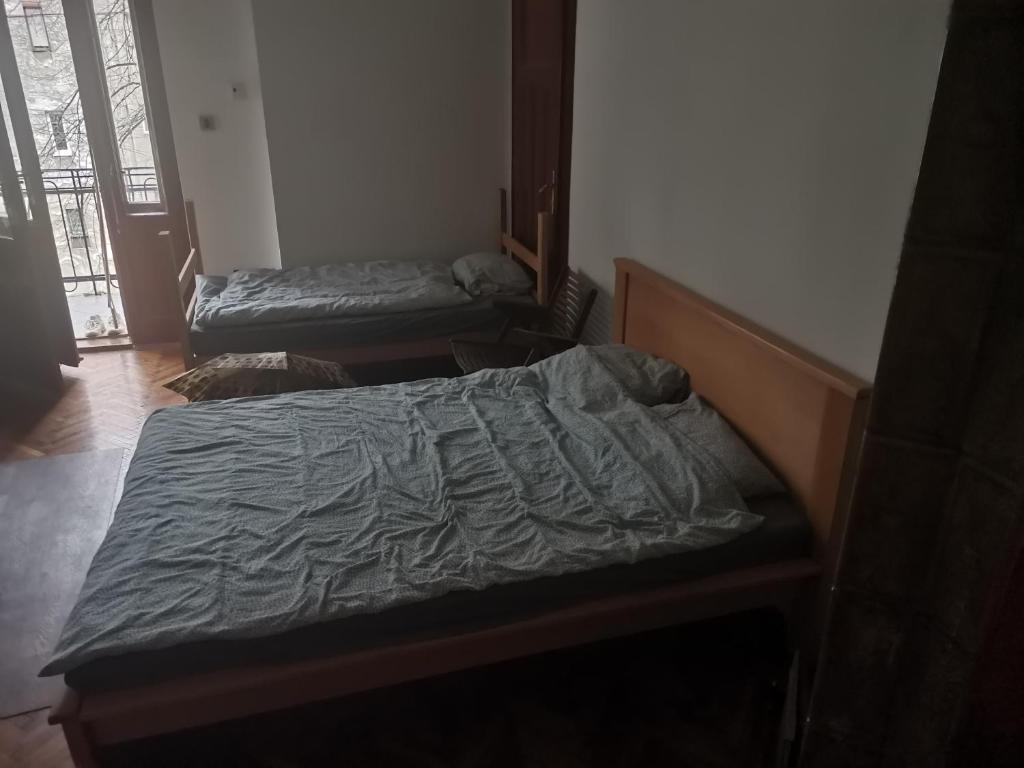 Postel nebo postele na pokoji v ubytování Cozy place 1