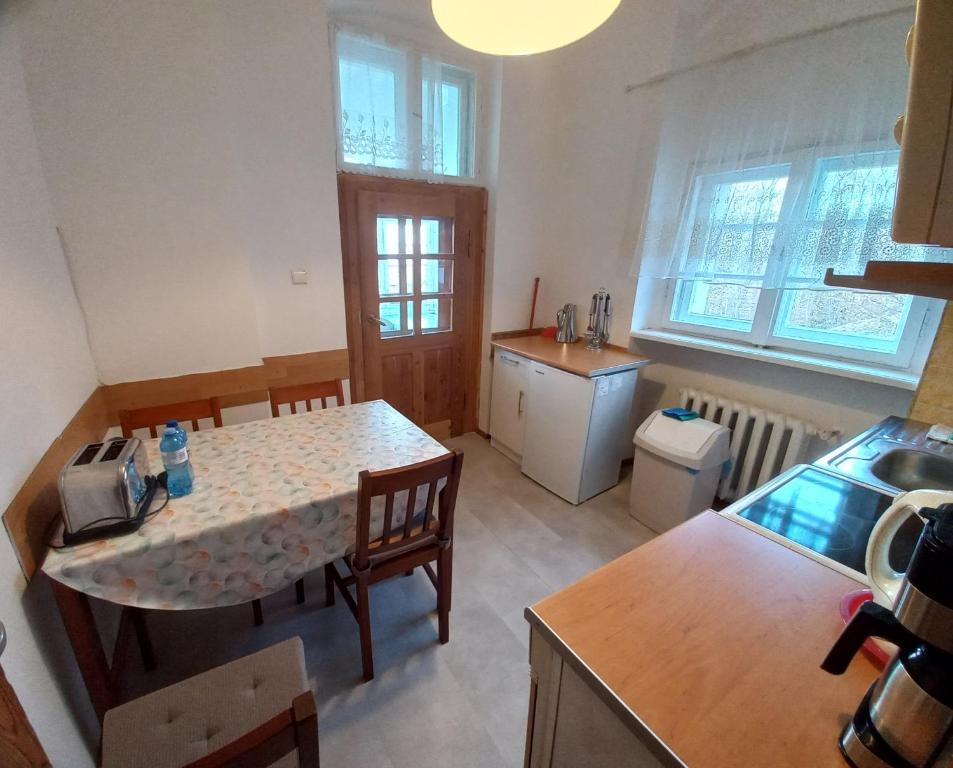 Kuchyň nebo kuchyňský kout v ubytování Apartamenty Maria