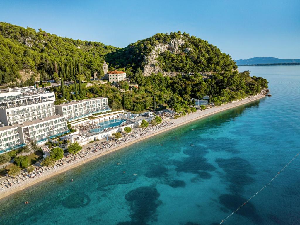 an aerial view of a resort on a beach at TUI BLUE Adriatic Beach - All Inclusive - Adults Only in Igrane