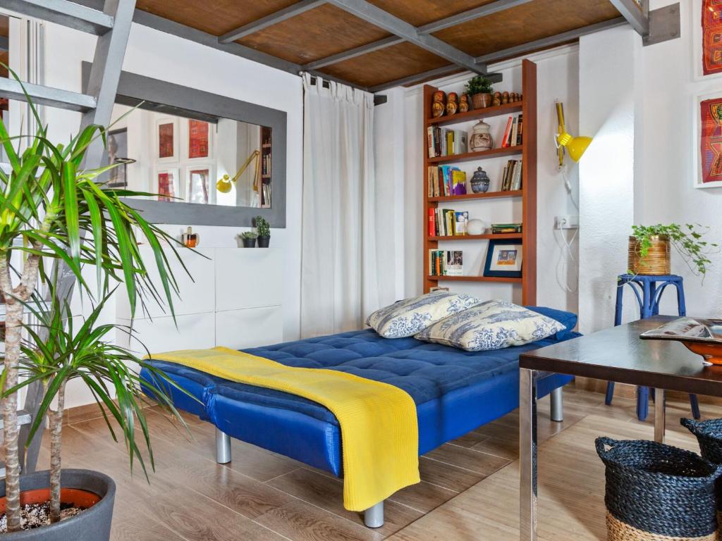 Postel nebo postele na pokoji v ubytování Belvilla by OYO Apartamento Loft Sorrapa