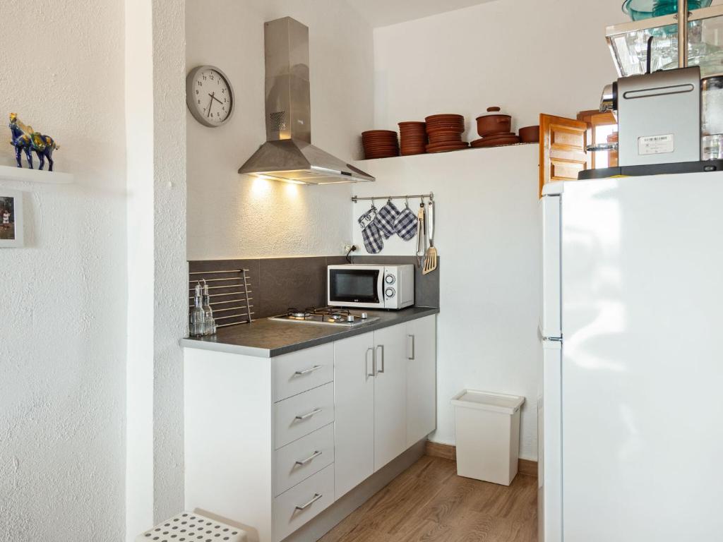 Kuchyň nebo kuchyňský kout v ubytování Belvilla by OYO Apartamento Loft Sorrapa
