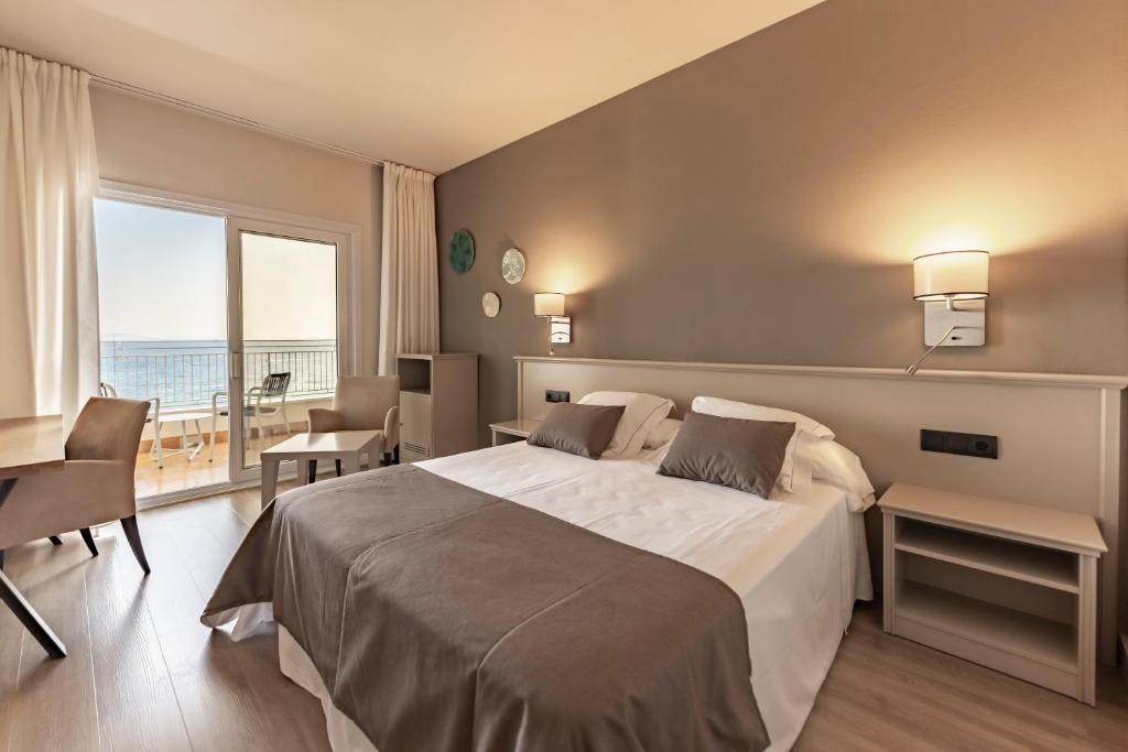 Postel nebo postele na pokoji v ubytování Hotel & Spa Terraza 4 Sup