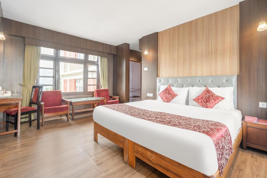 Postel nebo postele na pokoji v ubytování Summit Tashi Ghang Heritage Resort