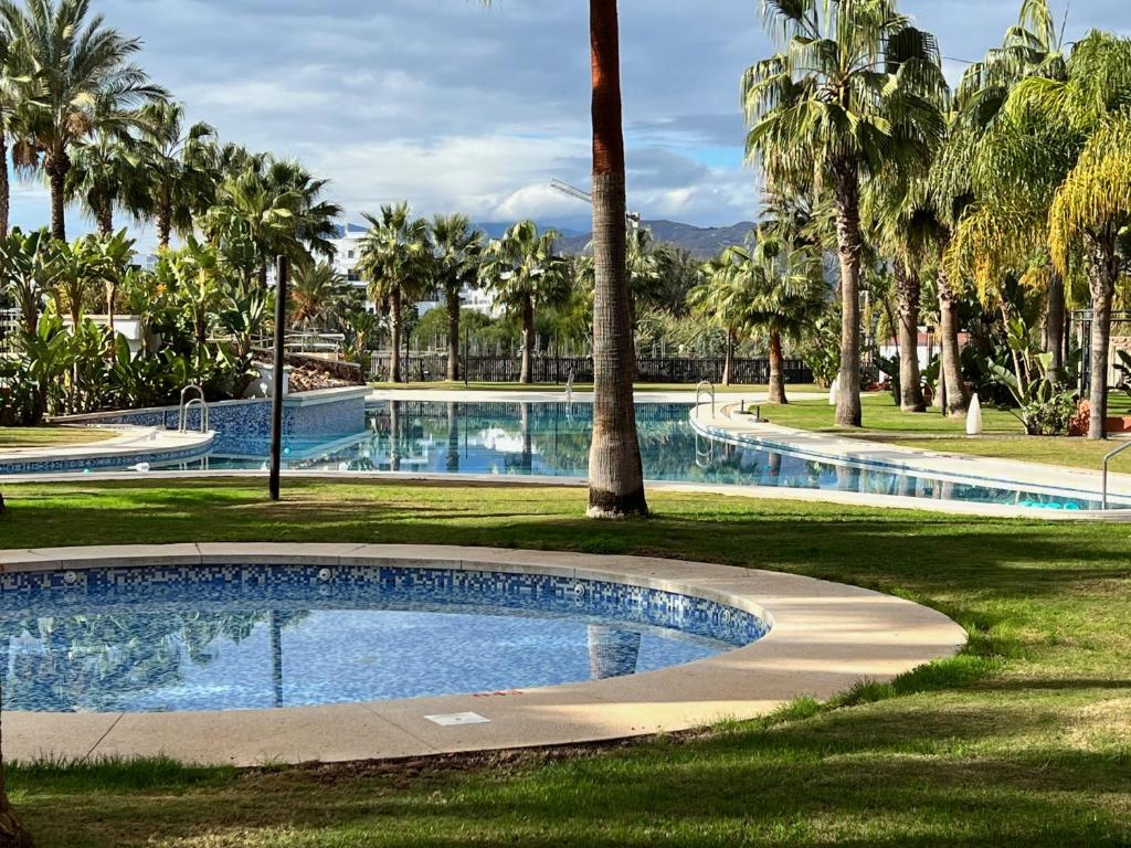 Bazén v ubytovaní PUSHE Playa Granada Beach&Golf 6 alebo v jeho blízkosti