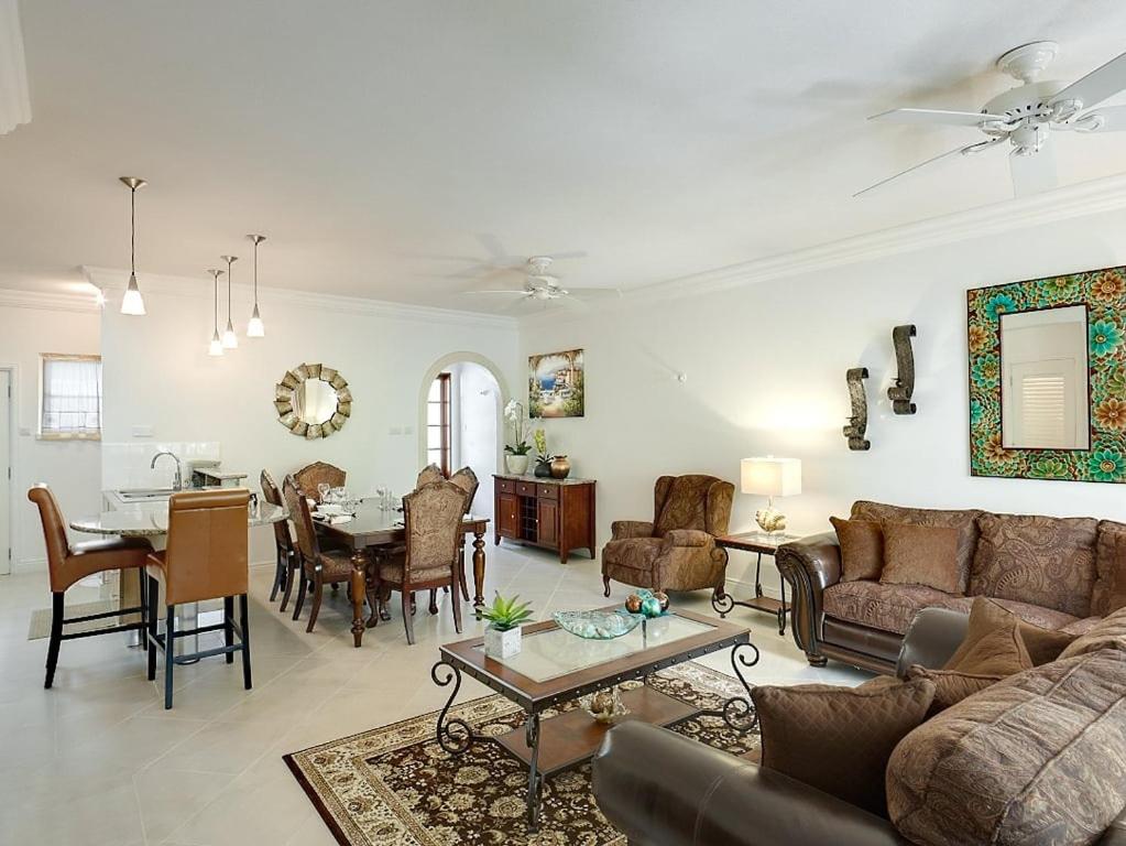 a living room with a couch and a table at The Falls Townhouse 10 by BSL Rentals in Saint James