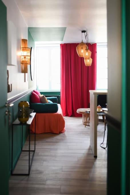 Posteľ alebo postele v izbe v ubytovaní Appartement Bollyroom - Plage 50m - Rue gratuite