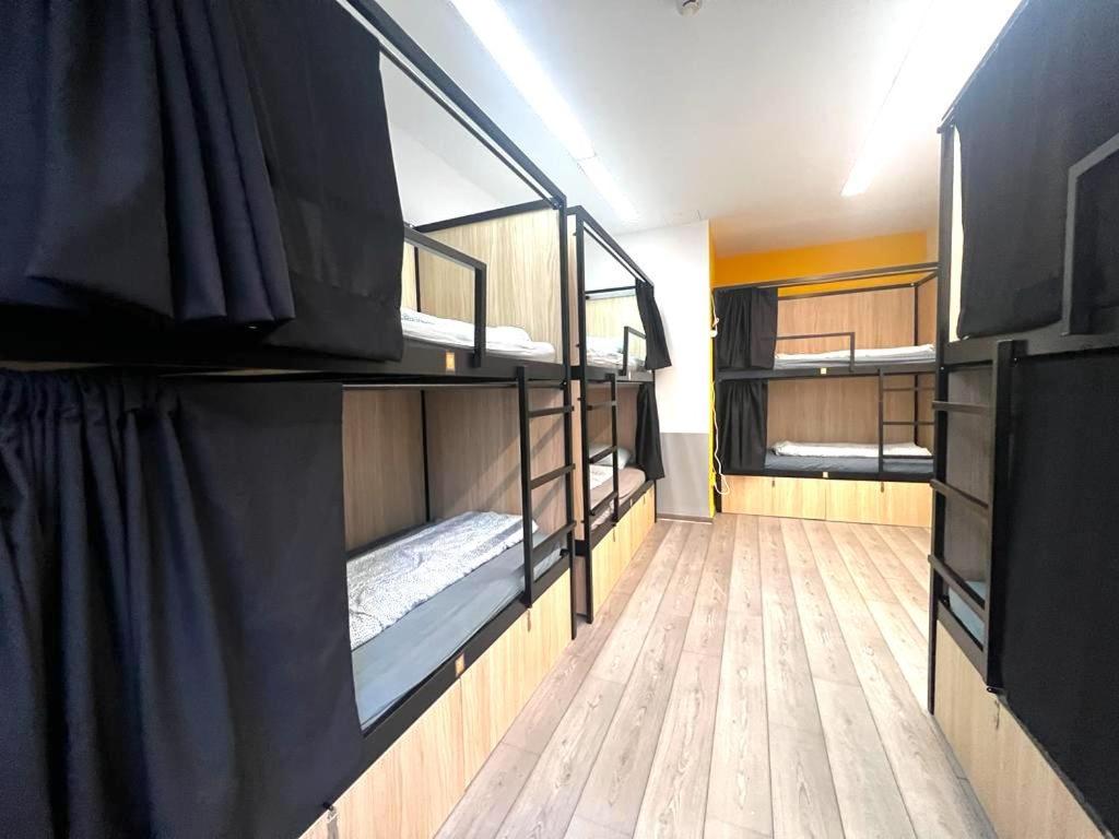 Postel nebo postele na pokoji v ubytování Onefam Budapest