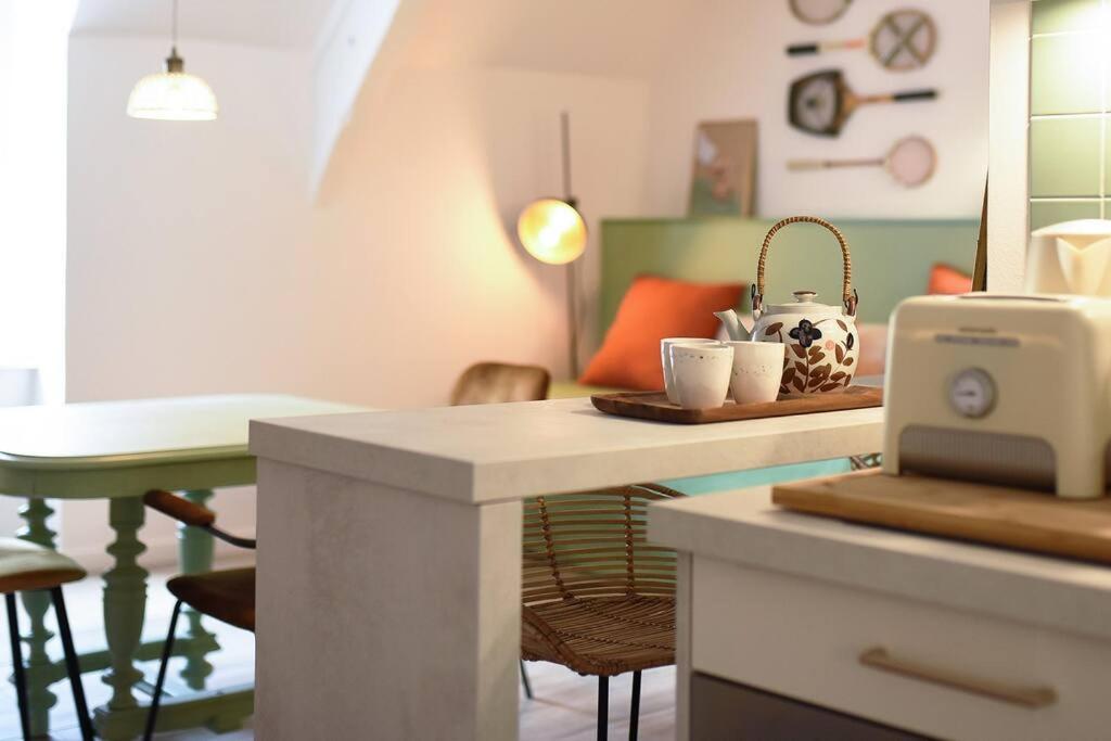 Kuchyňa alebo kuchynka v ubytovaní Appartement Moonrise - Plage 50m - Rue gratuite