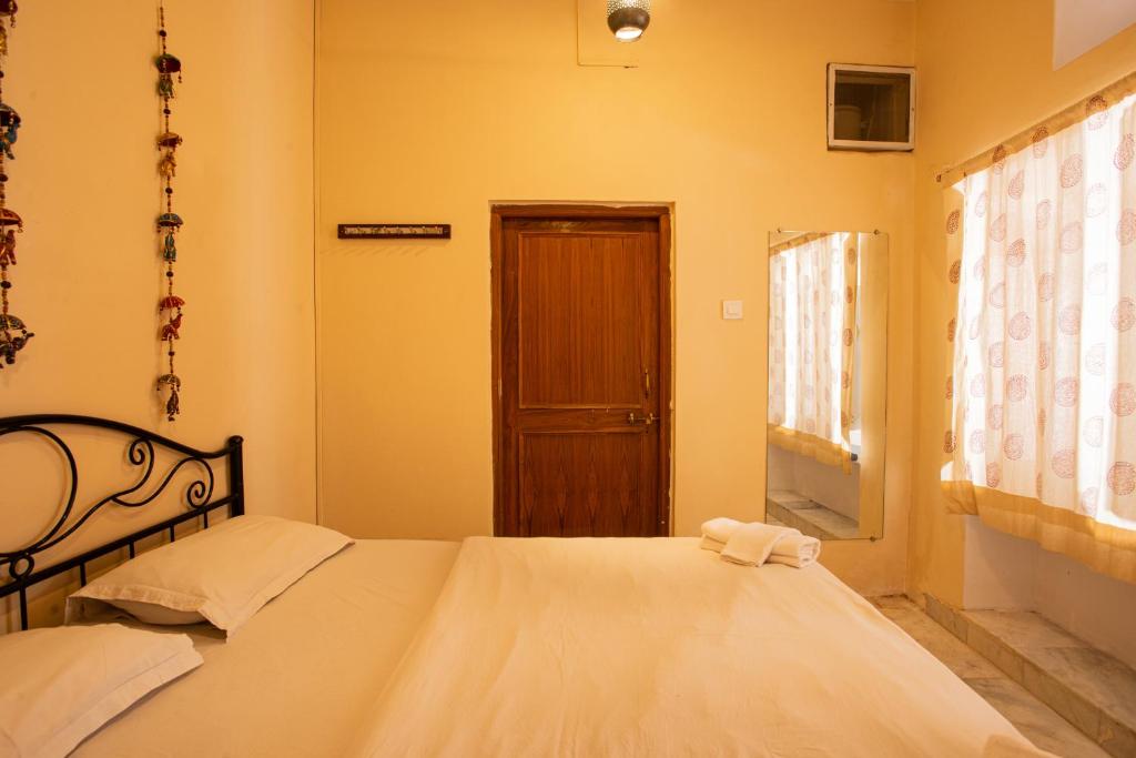 Postel nebo postele na pokoji v ubytování Hostel Mantra